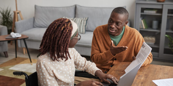 Father and daughter on a computer