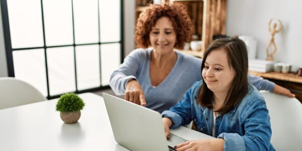 Mother and daughter looking at a computer