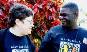 Two Best Buddies participants smiling together
